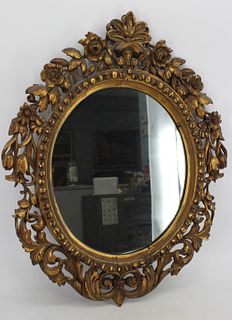 Antique And Highly Carved Giltwood Mirror.