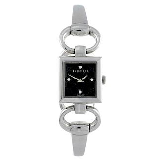 GUCCI - a lady's 120 bracelet watch. Stainless steel case. Numbered 12302253. Signed quartz movement
