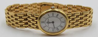 JEWELRY. Lady's Baume & Mercier 18kt Gold Watch.