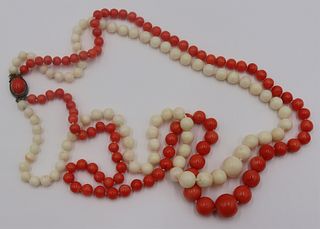 JEWELRY. Double Strand Carved Coral Necklace.