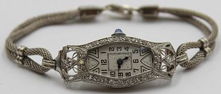 JEWELRY. Art Deco Platinum Diamond Watch.