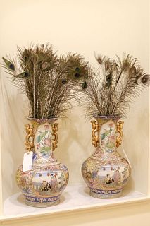 Pair (2) of Chinese vases with gold handles filled with peacock feathers
