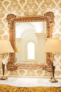 Mirror carved in stained pine w/large triple shell motif in corners and gilt accents