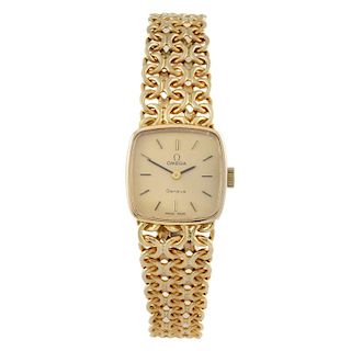 OMEGA - a lady's Geneve bracelet watch. 9ct yellow gold case, import hallmarked London 1974. Numbere