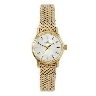 OMEGA - a lady's bracelet watch. 9ct yellow gold case, hallmarked London 1968. Numbered 7655871. Sig
