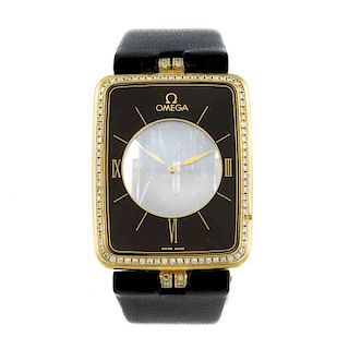 OMEGA - a gentleman's Mystery Magique wrist watch. 18ct yellow gold case with factory diamond set be