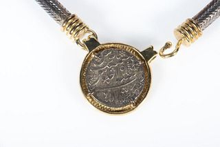 Coin, silver and yellow metal necklace