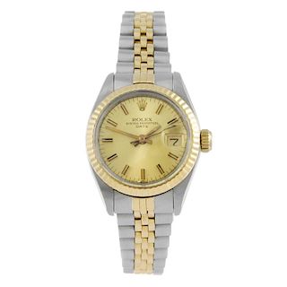 ROLEX - a lady's Oyster Perpetual Datejust bracelet watch. Circa 1983. Stainless steel case with yel