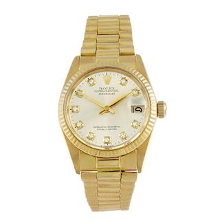 ROLEX - a mid-size Oyster Perpetual Datejust bracelet watch. Circa 1980. 18ct yellow gold case. Refe