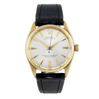 ROLEX - a gentleman's Oyster Perpetual wrist watch. Circa 1948. 9ct yellow gold case, engine turned