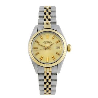 ROLEX - a lady's Oyster Perpetual Date bracelet watch. Circa 1978. Stainless steel case with yellow