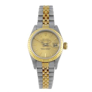 ROLEX - a lady's Oyster Perpetual Datejust bracelet watch. Circa 1986. Stainless steel case with yel