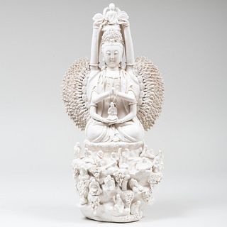 Chinese White Glazed Porcelain Figure of Seated Deity