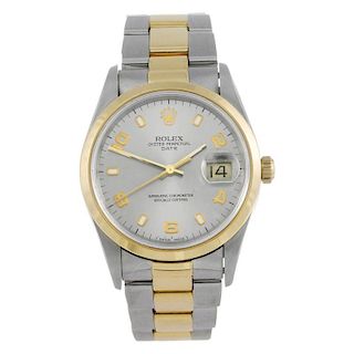 ROLEX - a gentleman's Oyster Perpetual Date bracelet watch. Stainless steel case with yellow metal b