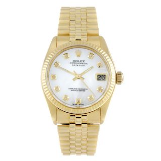 ROLEX - a mid-size Oyster Perpetual Datejust bracelet watch. Circa 1978. 18ct yellow gold case with