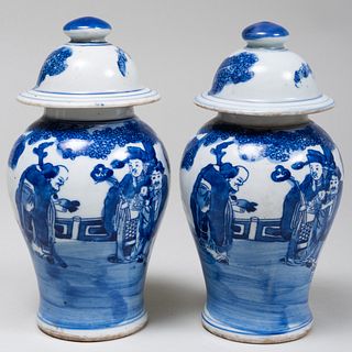 Pair of Chinese Blue and White Porcelain Jars with Associated Covers