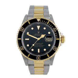 ROLEX - a gentleman's Oyster Perpetual Date Submariner bracelet watch. Stainless steel case with yel