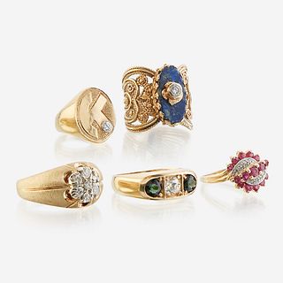 A collection of five gold and gem-set rings