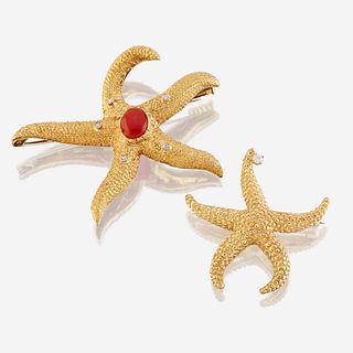 A group of two eighteen karat gold and gem-set brooches