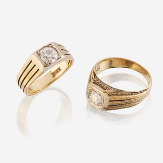 A pair of fourteen karat gold and diamond rings