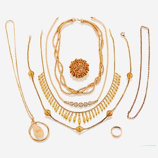 A collection of eight pieces of gold and gem-set jewelry