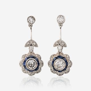 A pair of diamond, sapphire, and platinum earrings