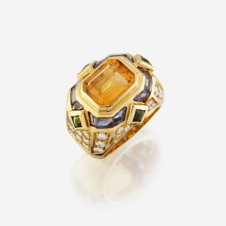 A citrine, diamond, sapphire, peridot, and eighteen karat gold ring