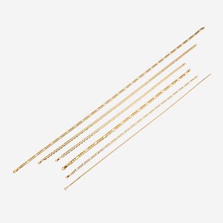 A collection of six fourteen karat gold necklaces
