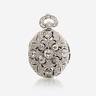 An eighteen karat white gold and diamond pendant locket