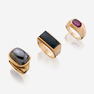 A collection of gold and gem-set rings