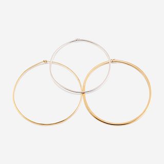 A collection of three fourteen karat gold necklaces