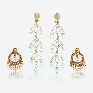Two pairs of fourteen karat gold and gem-set ear clips