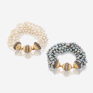 A pair of cultured pearl, diamond, sapphire, and eighteen karat gold bracelets