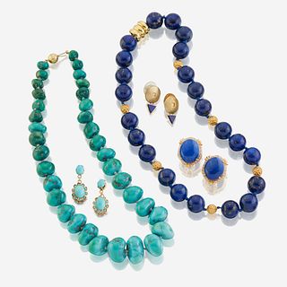 A collection of lapis lazuli, turquoise, and gold jewelry