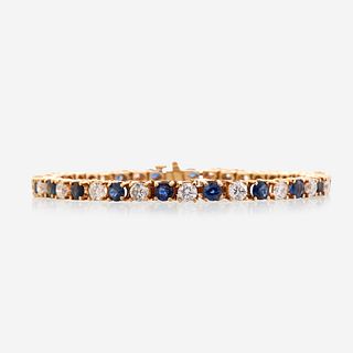 A diamond, sapphire, and fourteen karat gold bracelet