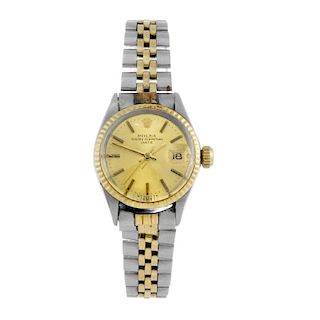 ROLEX - a lady's Oyster Perpetual Date bracelet watch. Circa 1969. Stainless steel case with yellow