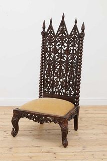 A colonial rosewood high-backed chair,