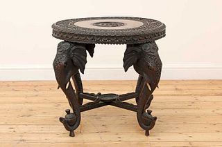 A carved rosewood centre table,