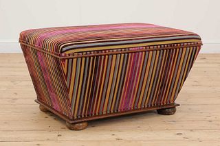 An upholstered ottoman,