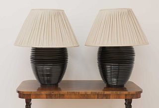 A pair of large turned table lamps,