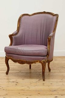 A Régence-style giltwood fauteuil,