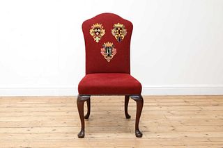 A Queen Anne-style upholstered side chair,