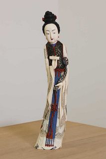 A Chinese carved ivory 'long' lady,