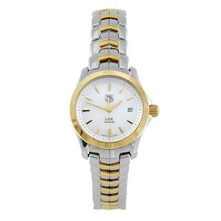 TAG HEUER - a lady's Link bracelet watch. Stainless steel case with yellow metal bezel. Reference WJ