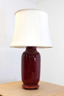 A Chinese sang-de-boeuf glazed porcelain table lamp,
