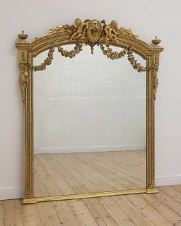 A large giltwood overmantel mirror,