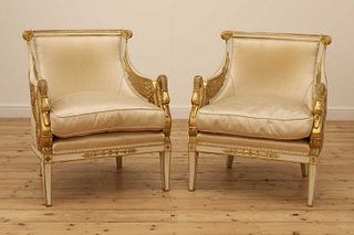 A pair of Empire-style giltwood armchairs,