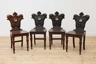 A set of four Victorian hall chairs,