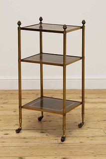 A three-tier étagère occasional table,