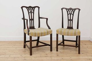 A set of ten Chippendale-style mahogany dining chairs,